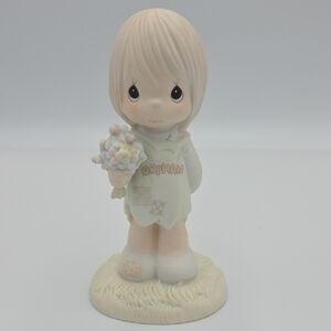 Precious Moments Cream and Pastel Figurine